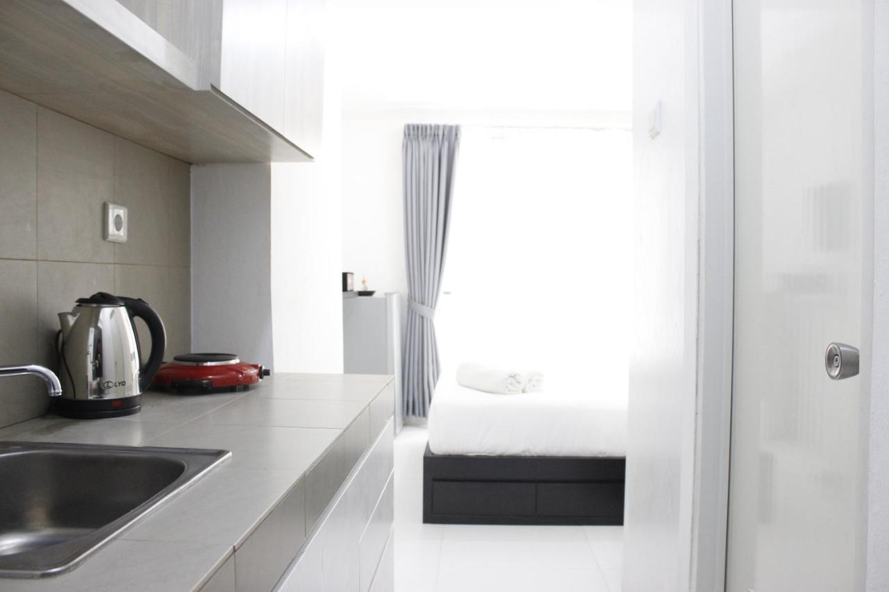 Monochrome Style @grand Afrika By Travelio * Bandung