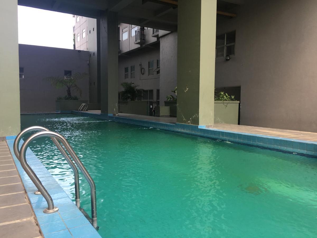Monochrome Style @grand Afrika By Travelio Apartemen
