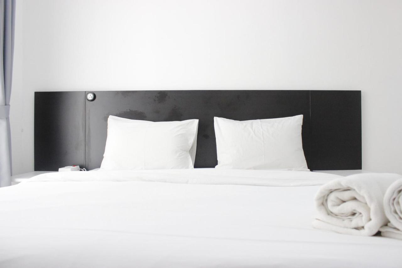 Apartemen Monochrome Style @grand Afrika By Travelio *