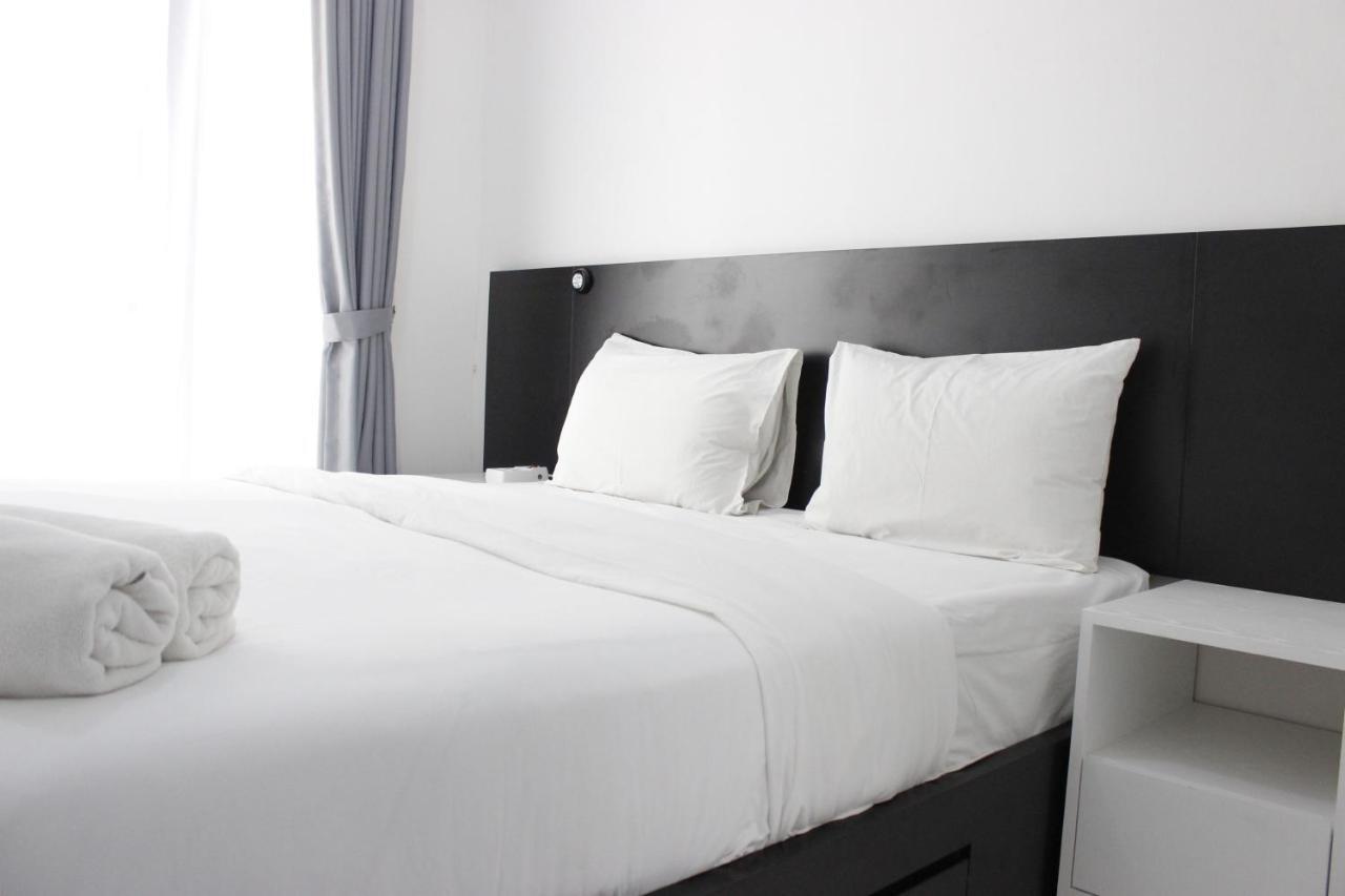 Monochrome Style @grand Afrika By Travelio Bandung