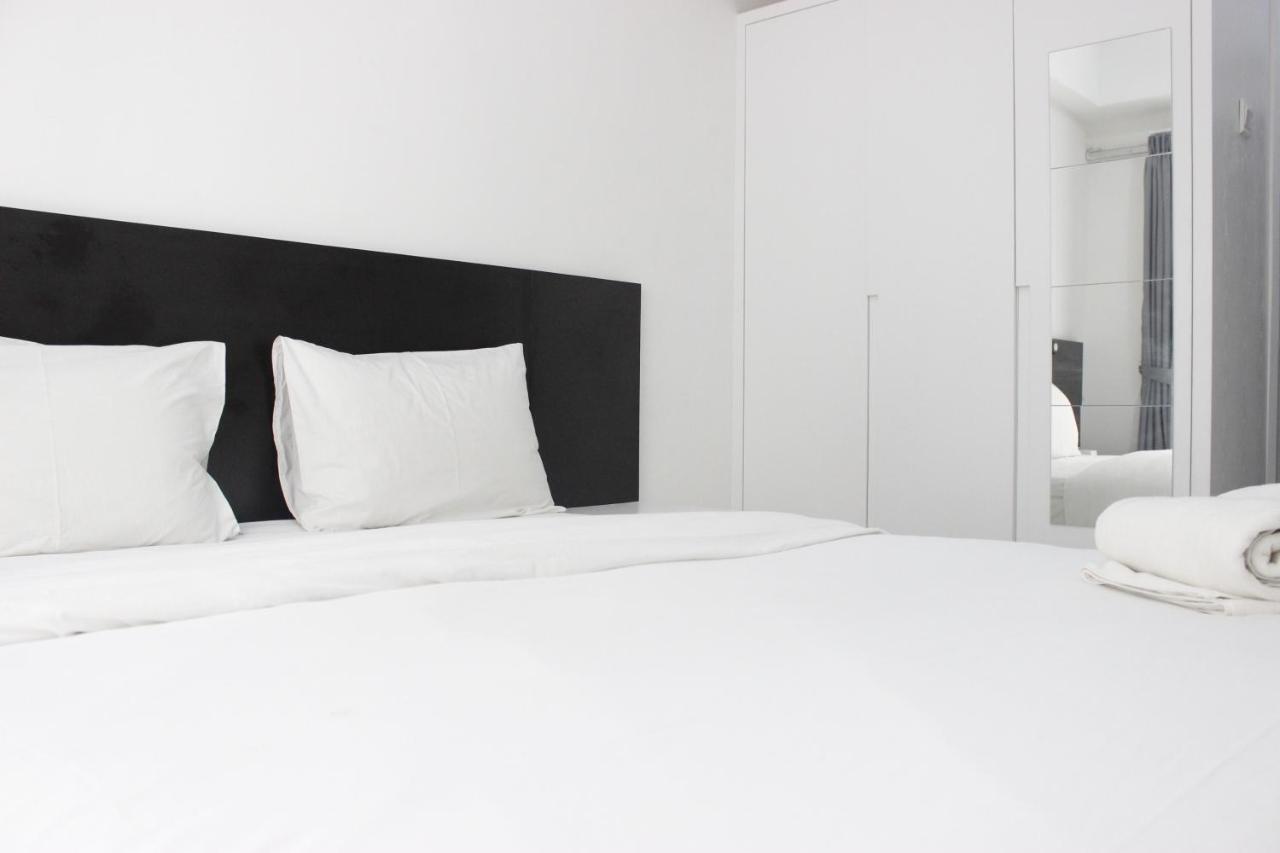 Apartemen Monochrome Style @grand Afrika By Travelio